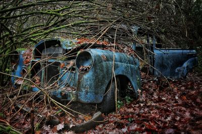 Old rusty metal on field