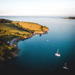 High angle view of ship sailing on sea against sky