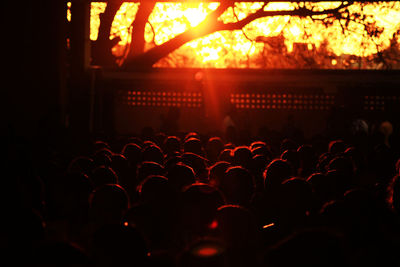 Silhouette crowd during sunset