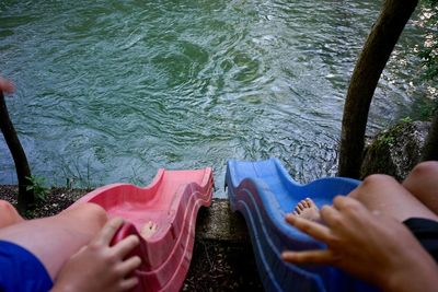 Low section of people on water slice