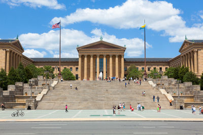 Group of people in front of historical building