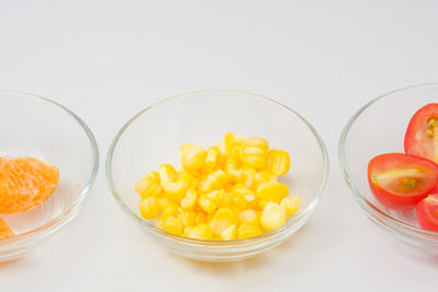 High angle view of orange fruits in glass container