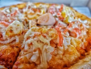 Close-up of pizza served in plate