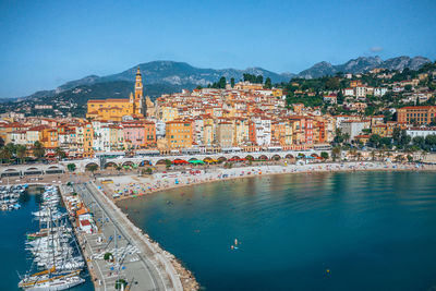 Aerial view of townscape against sky