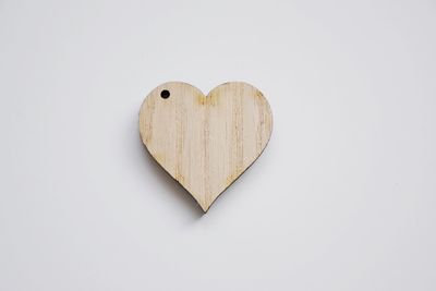 Close-up of heart shape over white background