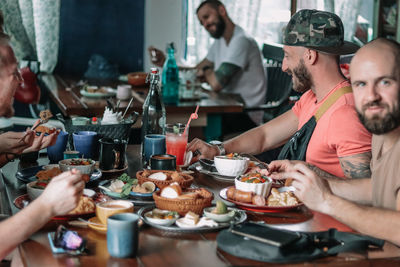 People having food in restaurant