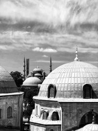 Hagia sophia buildings in city against cloudy sky