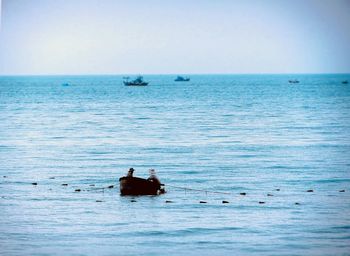 Scenic view of sea against clear sky