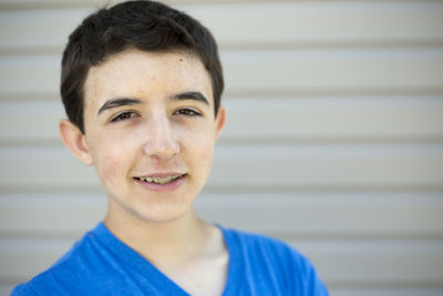 Close-up portrait of smiling boy