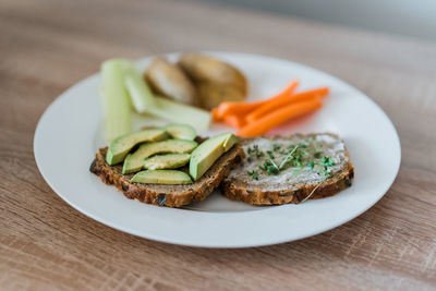 Close-up of chopped slices in plate on table