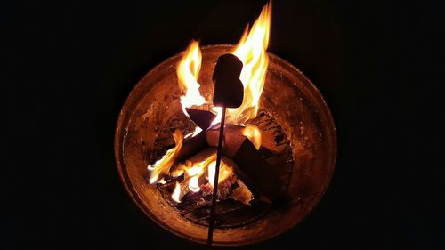 Close-up of burning candle