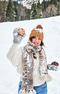 Winter portrait of a young woman. winter clothes, snow.