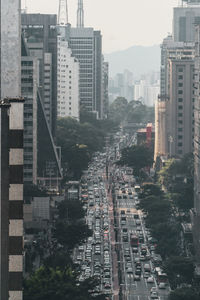 High angle view of road amidst buildings in city