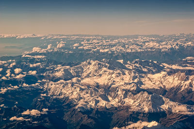 Aerial view of dramatic landscape against sky