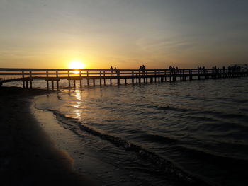 Scenic view of sea against clear sky during sunset