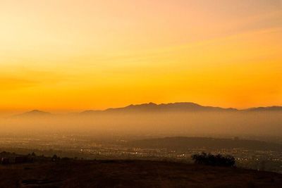 Scenic view of mountains at sunset