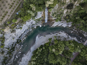 High angle view of waterfall in forest