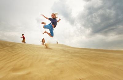 People walking on beach