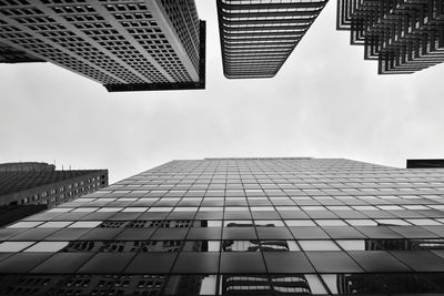 Low angle view of modern buildings against sky