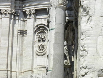 Low angle view of statue in front of building