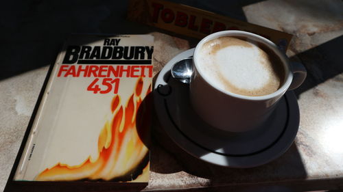 Close-up of coffee cup on table