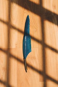 High angle view of shadow on table