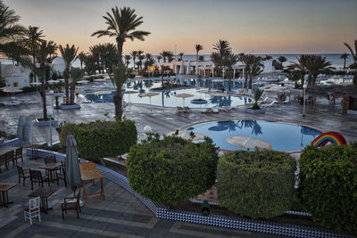 High angle view of swimming pool at sunset