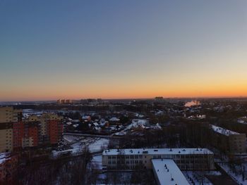 High angle view of townscape against sky during sunset