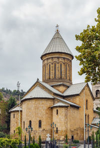 Exterior of historic building against sky