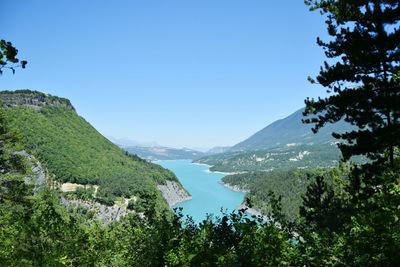 High angle view of river with mountains in background