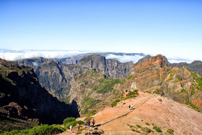 Scenic view of landscape against blue sky