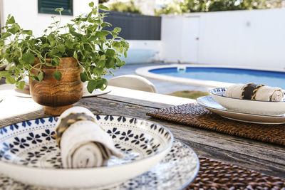 Place settings on table in garden