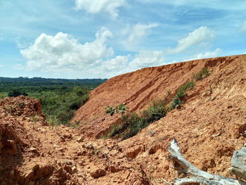 View of landscape against cloudy sky