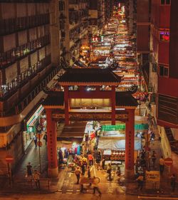 People in illuminated building