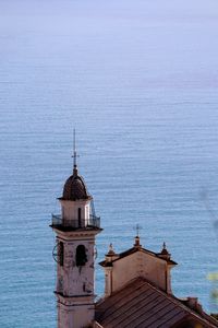 High angle view of building by sea against sky