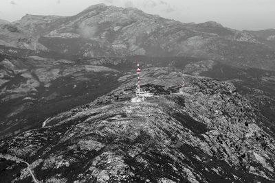 High angle view of communications tower on mountain