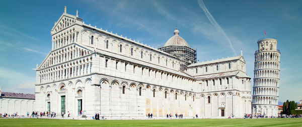 Group of people in front of historical building