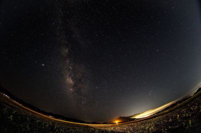 Low angle view of stars against sky at night