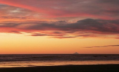 Scenic view of sea at sunset