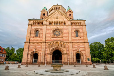 Facade of historic building against sky