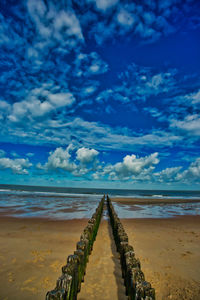 Scenic view of beach against sky