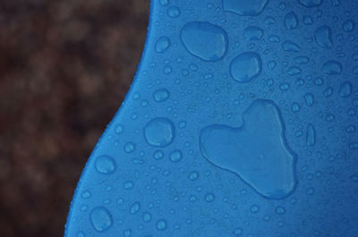 Close-up of wet blue surface