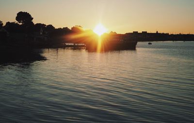 Scenic view of sunset over river