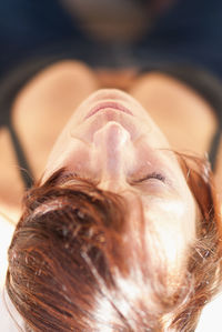 Close-up of woman with eyes closed