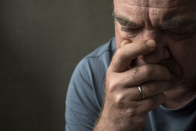 Close-up portrait of man making face