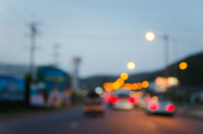 Defocused lights on road at night