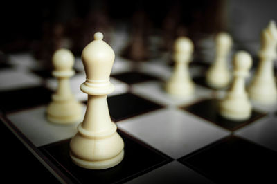 Close-up of chess pieces against blurred background