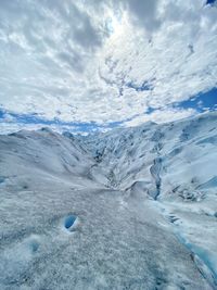 Scenic view of snowcapped mountain against sky