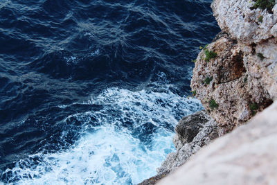 Scenic view of rocks in sea