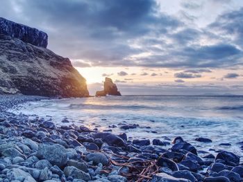 Scenic view of sea against sky during sunset